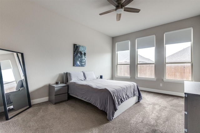 bedroom featuring ceiling fan and carpet floors