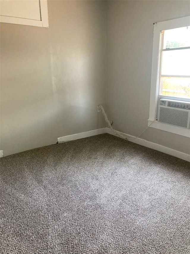 carpeted empty room with cooling unit