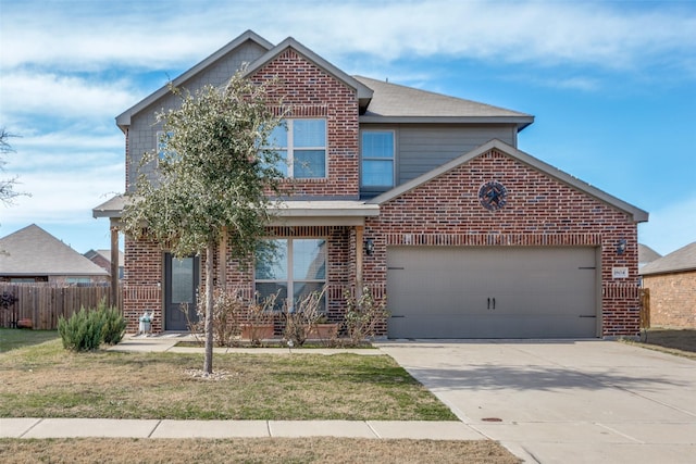 front facade featuring a front yard and a garage