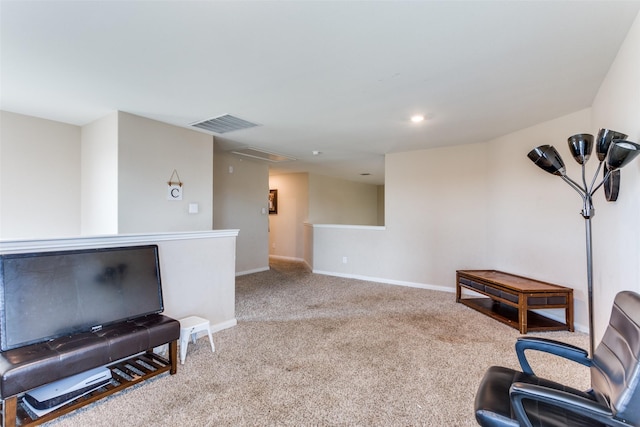 living area featuring carpet floors