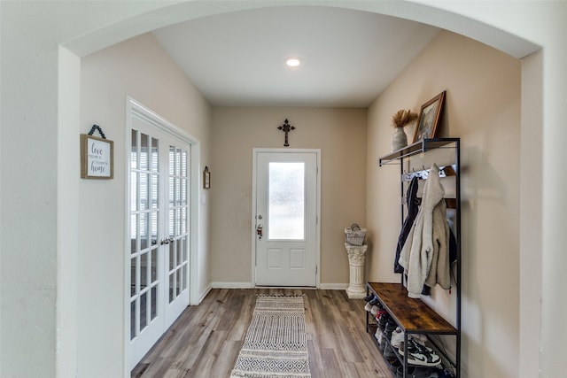 mudroom featuring light hardwood / wood-style floors and french doors