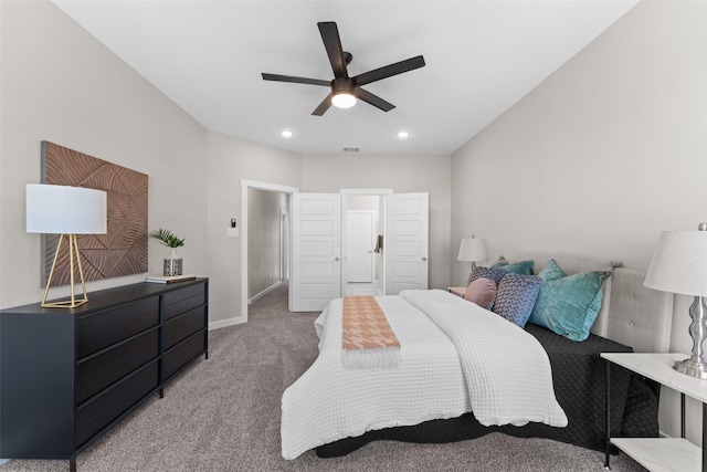 carpeted bedroom with baseboards, a ceiling fan, and recessed lighting