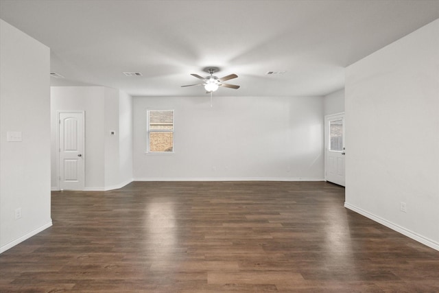 unfurnished room featuring ceiling fan and dark hardwood / wood-style flooring