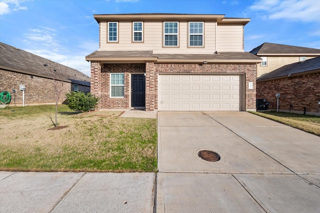 front facade featuring a front lawn and a garage