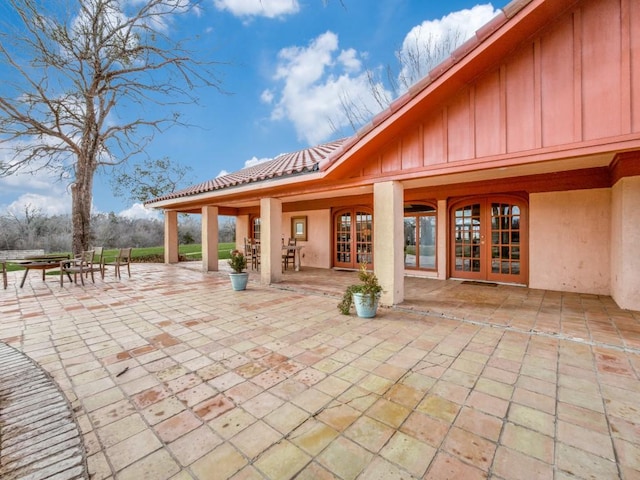 view of patio featuring french doors