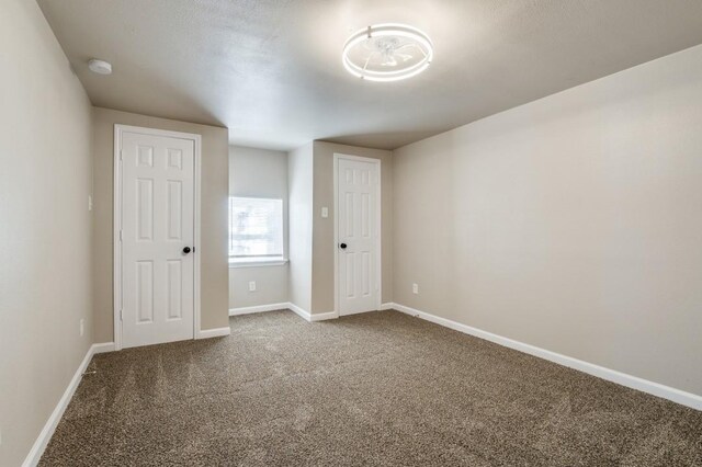 spare room with carpet floors