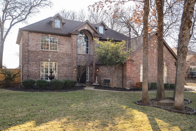 view of front of house with a front lawn