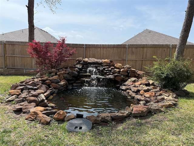 view of community featuring a yard