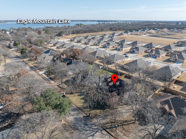 aerial view featuring a residential view and a water view