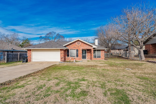 ranch-style house featuring a front yard and a garage