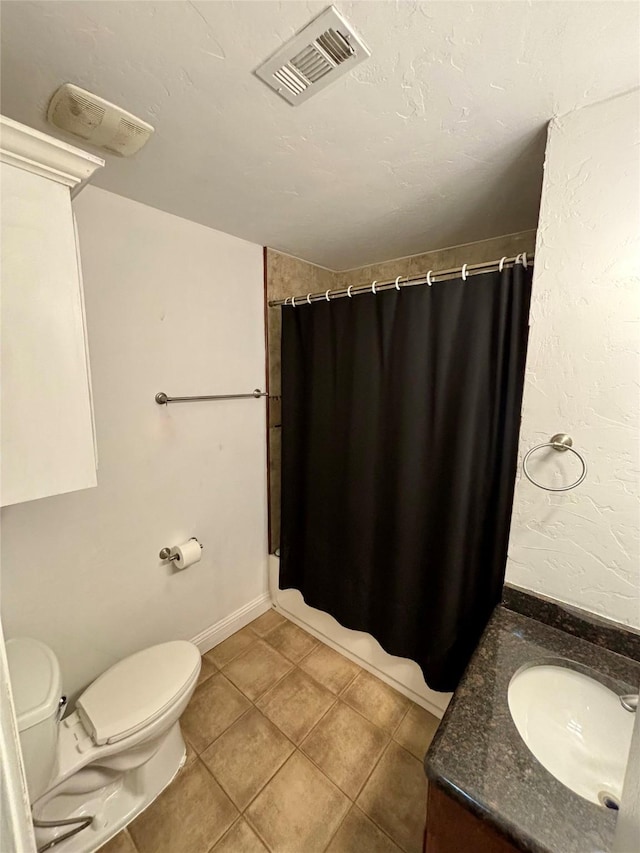 bathroom featuring toilet, tile patterned flooring, visible vents, and a shower with curtain