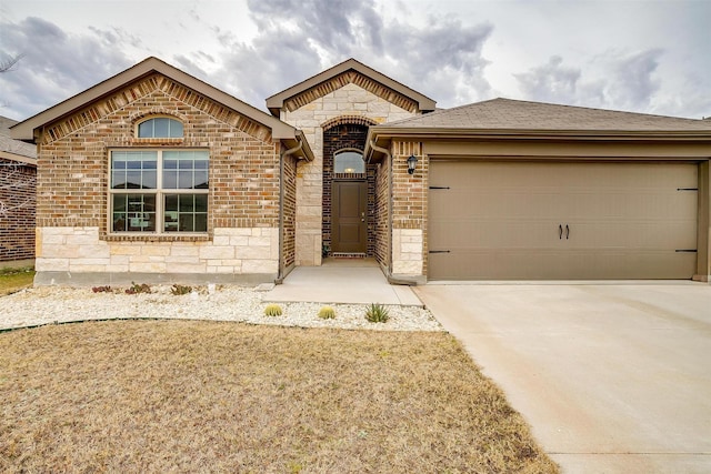 view of front of home featuring a garage