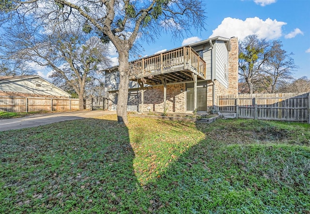 view of yard featuring a deck