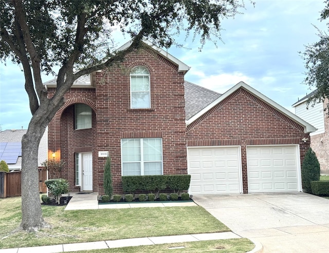 front of property with a garage