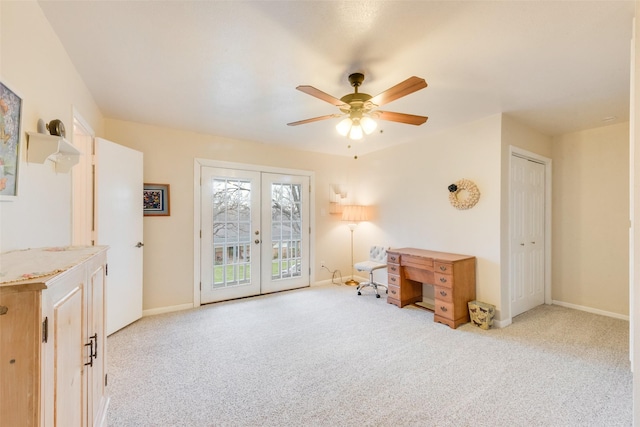 interior space featuring light carpet, ceiling fan, and french doors