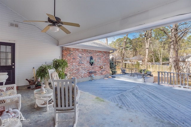 view of patio featuring ceiling fan and a wooden deck