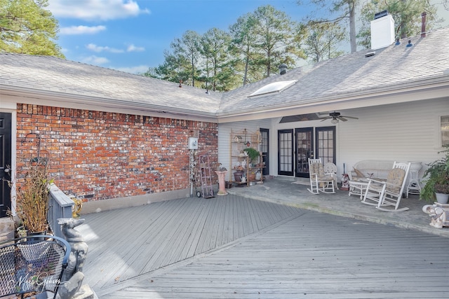 wooden deck with ceiling fan