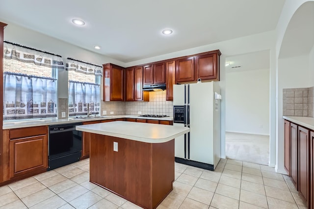 kitchen featuring light tile patterned flooring, white refrigerator with ice dispenser, black dishwasher, and a kitchen island