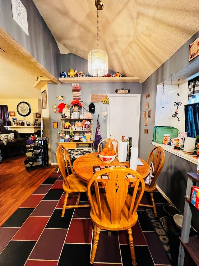 dining space featuring dark hardwood / wood-style flooring