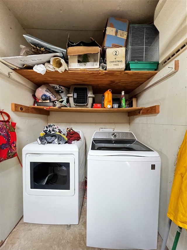 washroom featuring washer and dryer