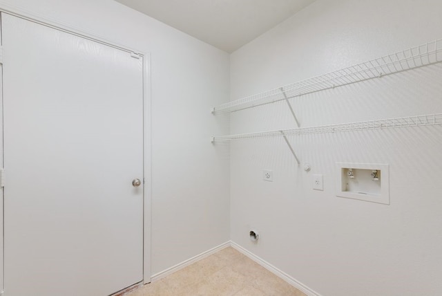 clothes washing area featuring washer hookup, hookup for a gas dryer, and hookup for an electric dryer