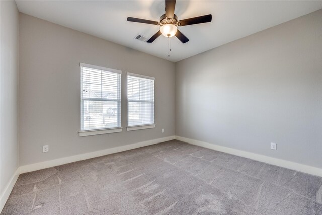 full bathroom with toilet, vanity, tile patterned flooring, and tiled shower / bath combo