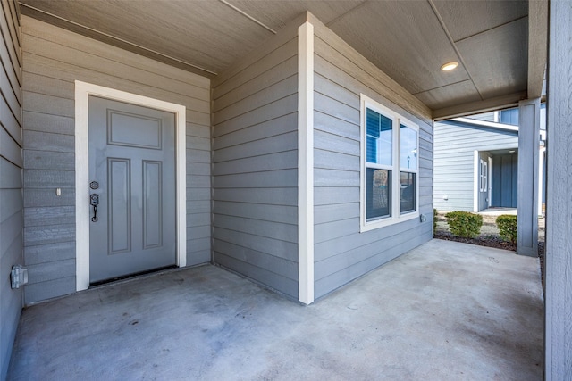 doorway to property featuring a patio