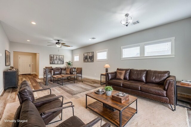 unfurnished room featuring ceiling fan and light hardwood / wood-style flooring