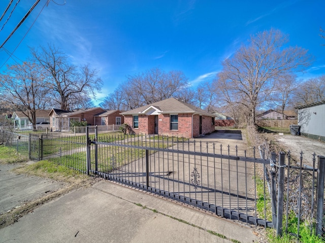 single story home featuring a front yard