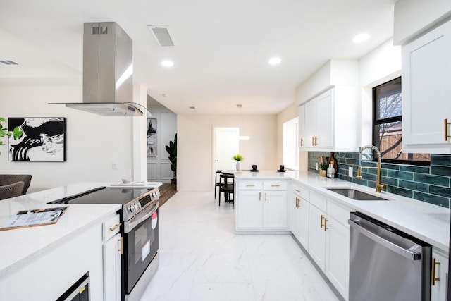 kitchen featuring sink, white cabinets, island range hood, and stainless steel appliances