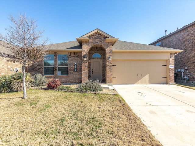 ranch-style house with a front yard and a garage