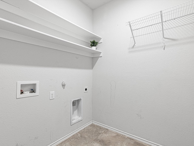 washroom with gas dryer hookup, hookup for a washing machine, hookup for an electric dryer, laundry area, and baseboards