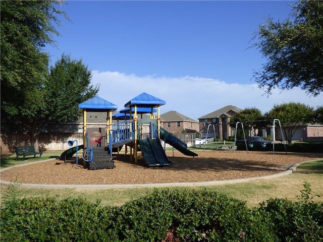 community play area featuring fence