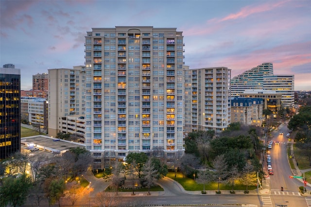 view of outdoor building at dusk