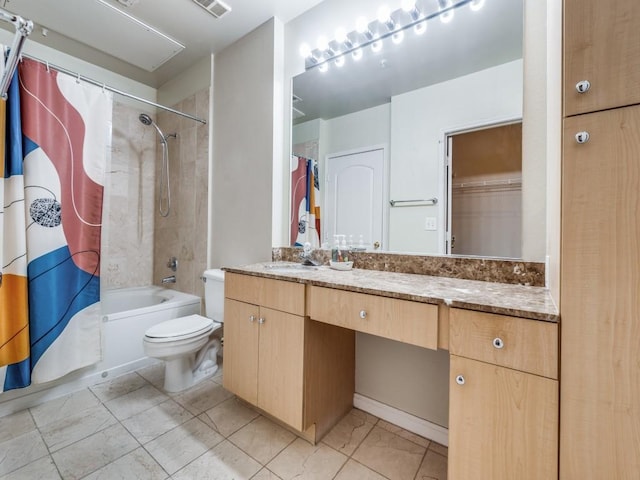 full bathroom featuring toilet, vanity, and shower / bathtub combination with curtain