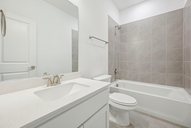 full bathroom with vanity, toilet, and tiled shower / bath