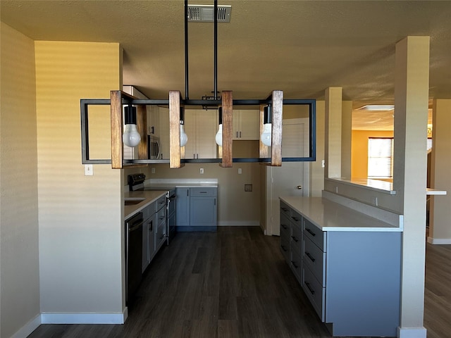 kitchen with a textured ceiling, dark hardwood / wood-style flooring, and black appliances