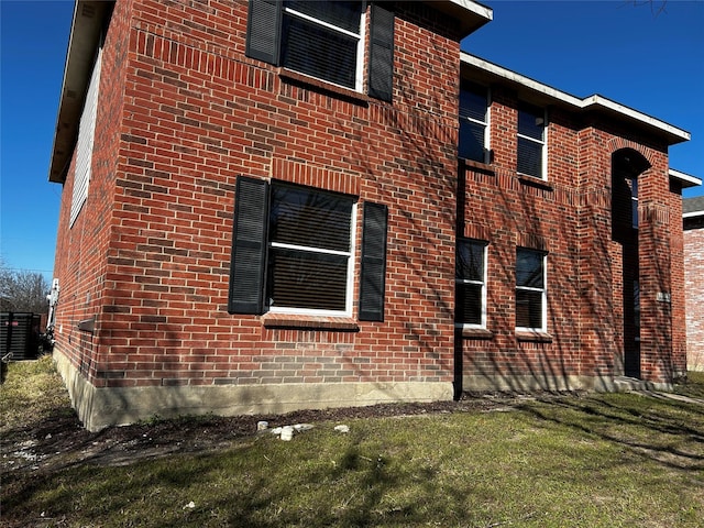 view of home's exterior featuring a yard