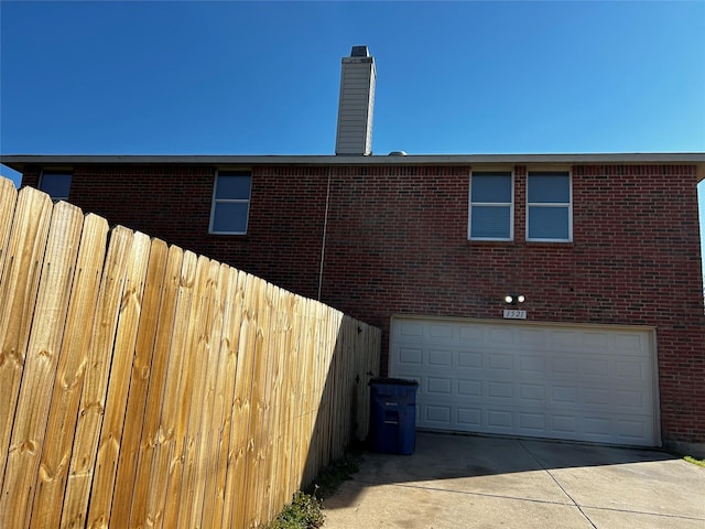 view of home's exterior with a garage