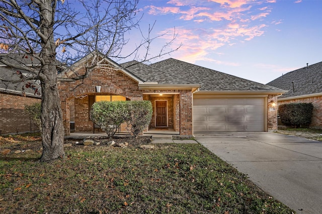 view of front of property featuring a garage