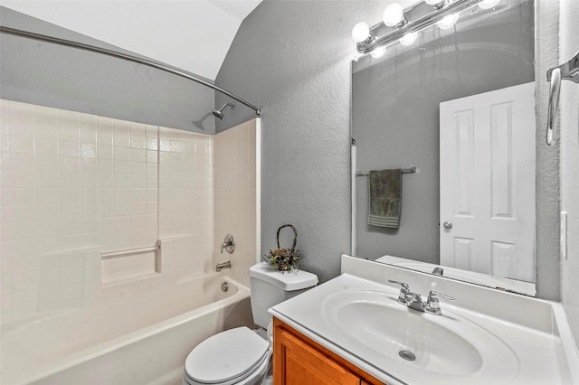 full bathroom featuring shower / bath combination, toilet, vanity, and lofted ceiling