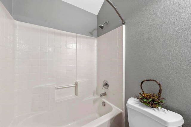 bathroom with toilet and shower / washtub combination