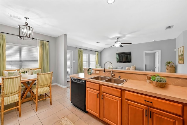 kitchen with decorative light fixtures, light tile patterned flooring, dishwasher, ceiling fan with notable chandelier, and sink