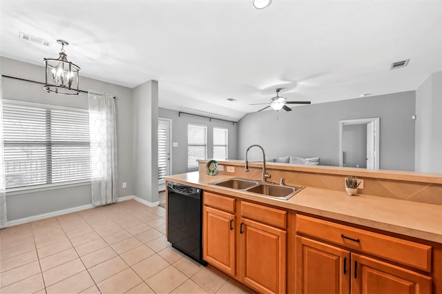 kitchen featuring decorative light fixtures, sink, black dishwasher, light tile patterned floors, and ceiling fan with notable chandelier