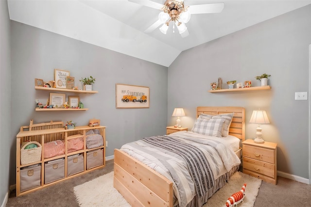 carpeted bedroom featuring vaulted ceiling and ceiling fan