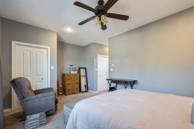 carpeted bedroom with ceiling fan