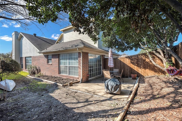 view of home's exterior with a patio area