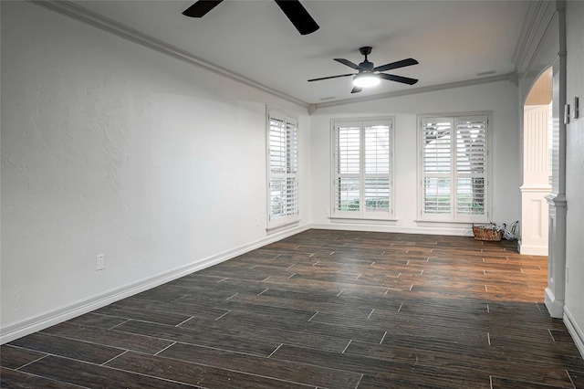 unfurnished room featuring dark wood-type flooring and ornamental molding