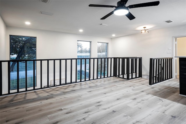 spare room featuring light hardwood / wood-style floors