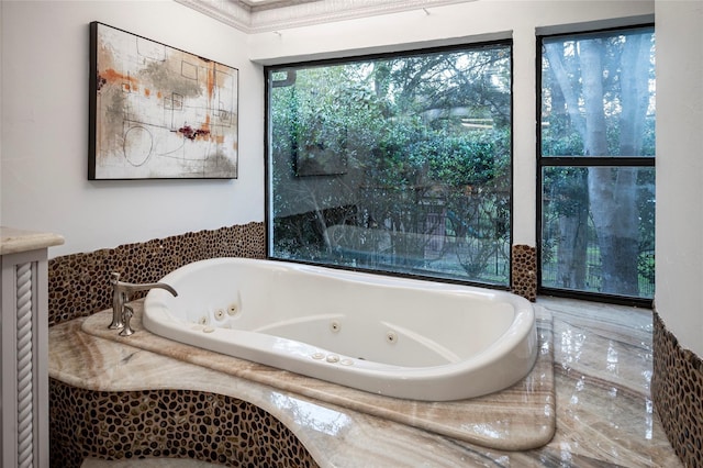 bathroom with tiled tub